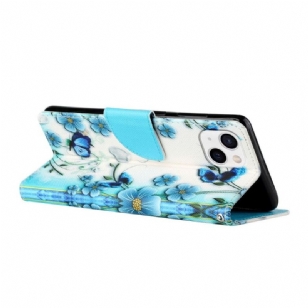 Housse iPhone 13 fleurs bleues et papillons