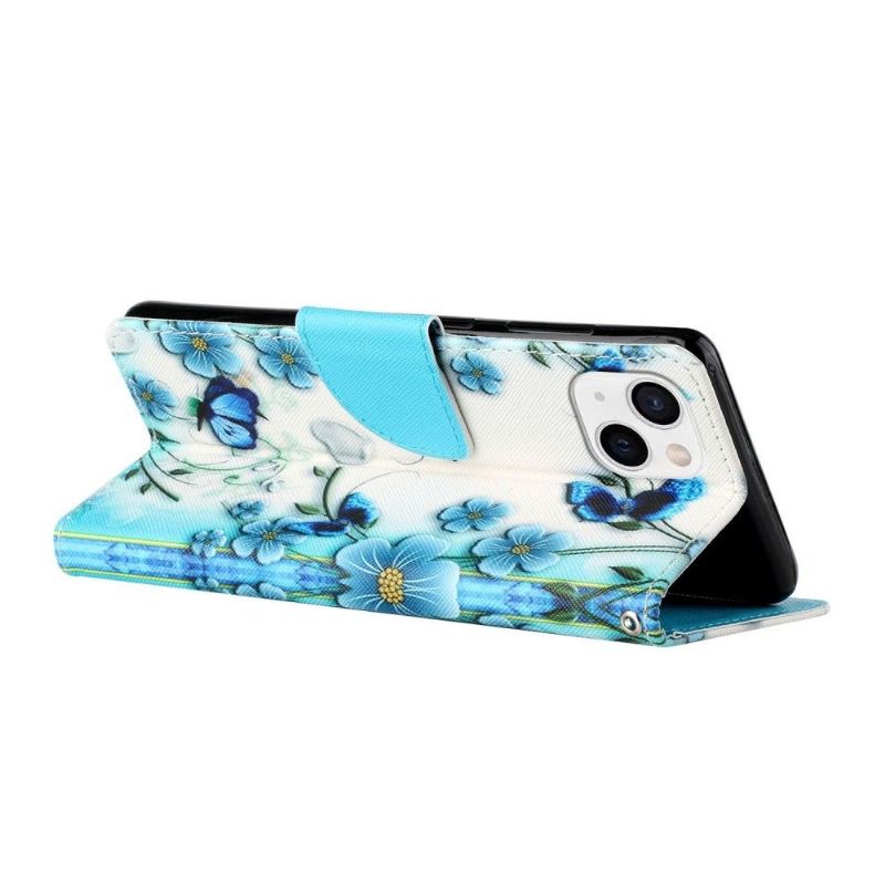 Housse iPhone 13 fleurs bleues et papillons