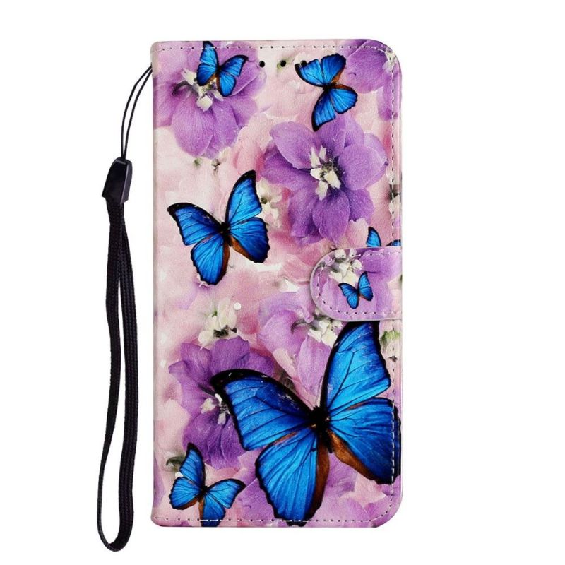 Housse Huawei P Smart 2020 papillons bleus et fleurs