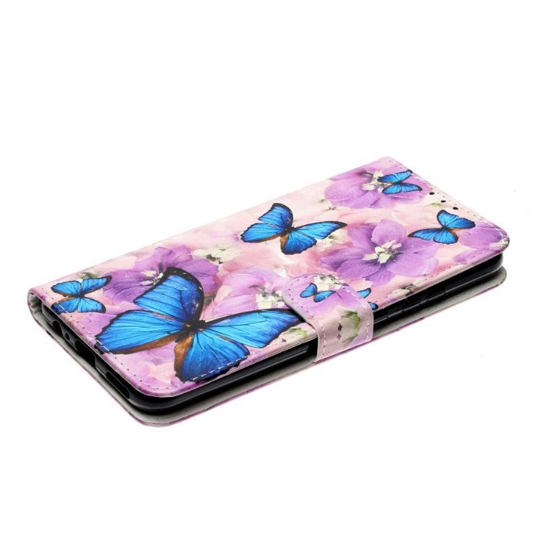 Housse Huawei P Smart 2020 papillons bleus et fleurs