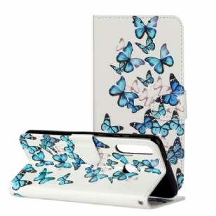 Housse Huawei Y6p Multiples Papillons Bleus