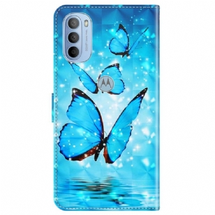 Housse Motorola Moto G31 / Moto G41 papillons bleus scintillants