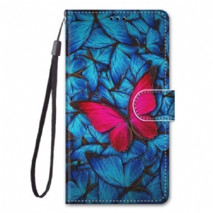 Housse Xiaomi 13 Papillon Rouge Sur Fond Bleu