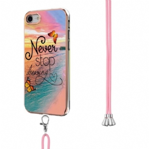 Coque iPhone SE 2022 / 2020 à cordon Never Stop Dreaming