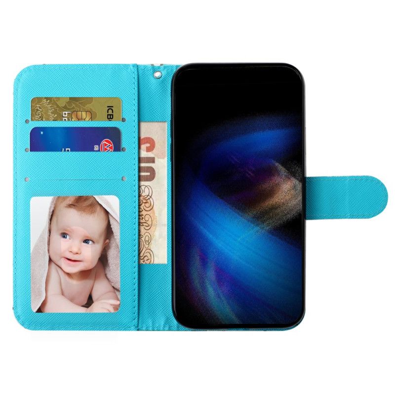 Housse iPhone 16 Pro Max Papillons Bleus Dorés à Lanière