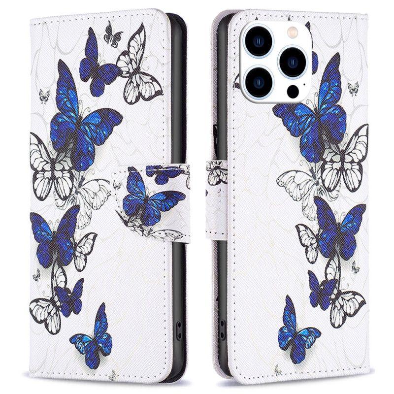 Housse iPhone 16 Pro Max Papillons Bleus en Vol