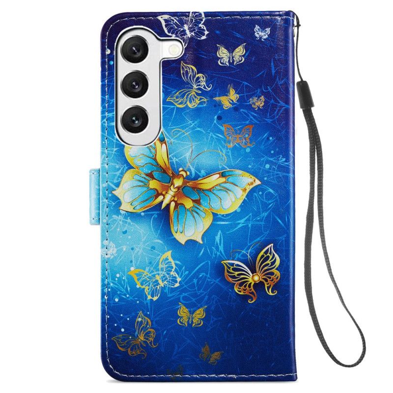 Housse Samsung Galaxy S24 5G Beaux Papillons Dorés à Lanière