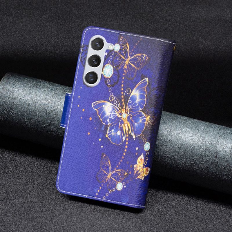 Housse Samsung Galaxy S24 5G Portefeuille Papillons Violets à Lanière