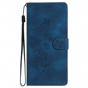 Housse iPhone 16 Fleurs Imprimées à Lanière