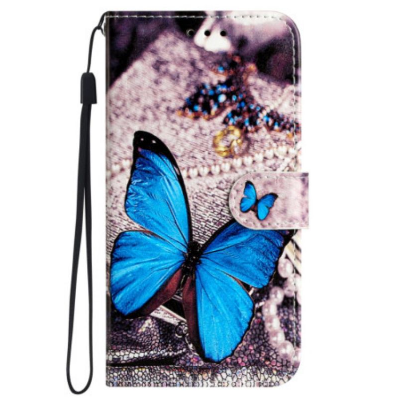 Housse iPhone 16 Papillon Bleu à Lanière