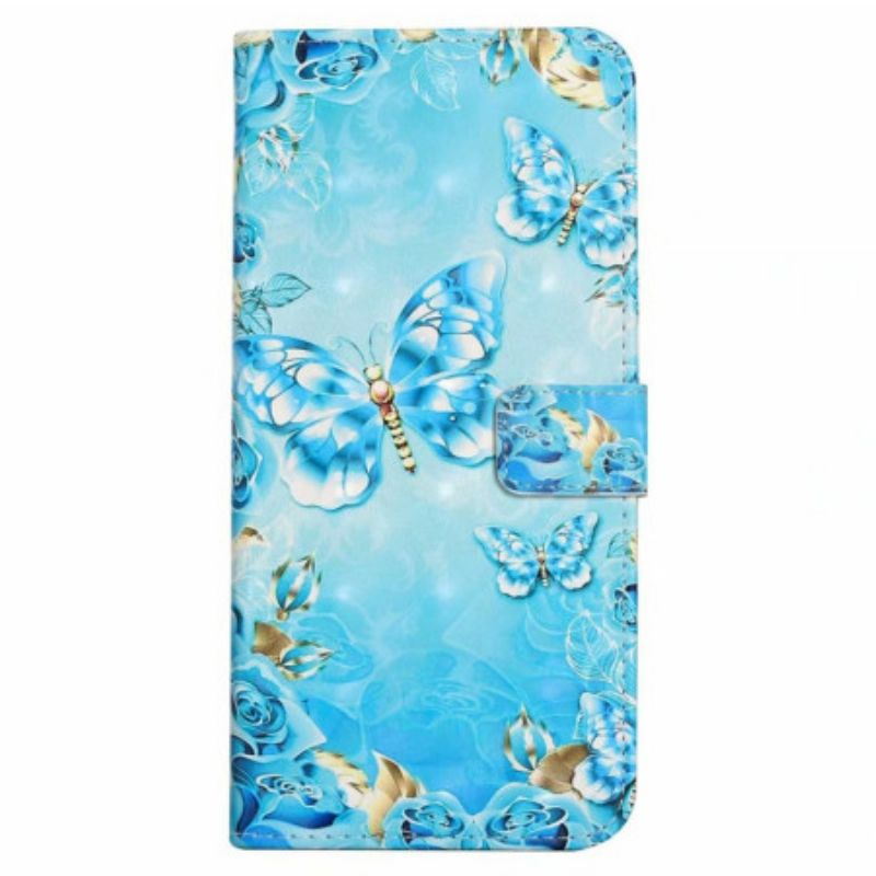 Housse iPhone 16 Papillons Bleus Clairs