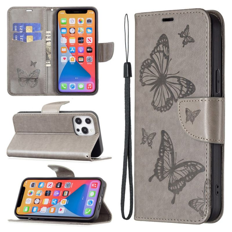 Housse iPhone 16 Papillons à Lanière