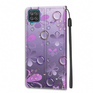 Housse Samsung Galaxy A12 / M12 Illustration fleurs violettes