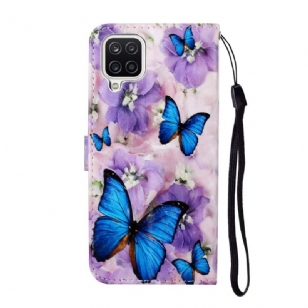 Housse Samsung Galaxy A12 / M12 Papillons Bleus et Fleurs