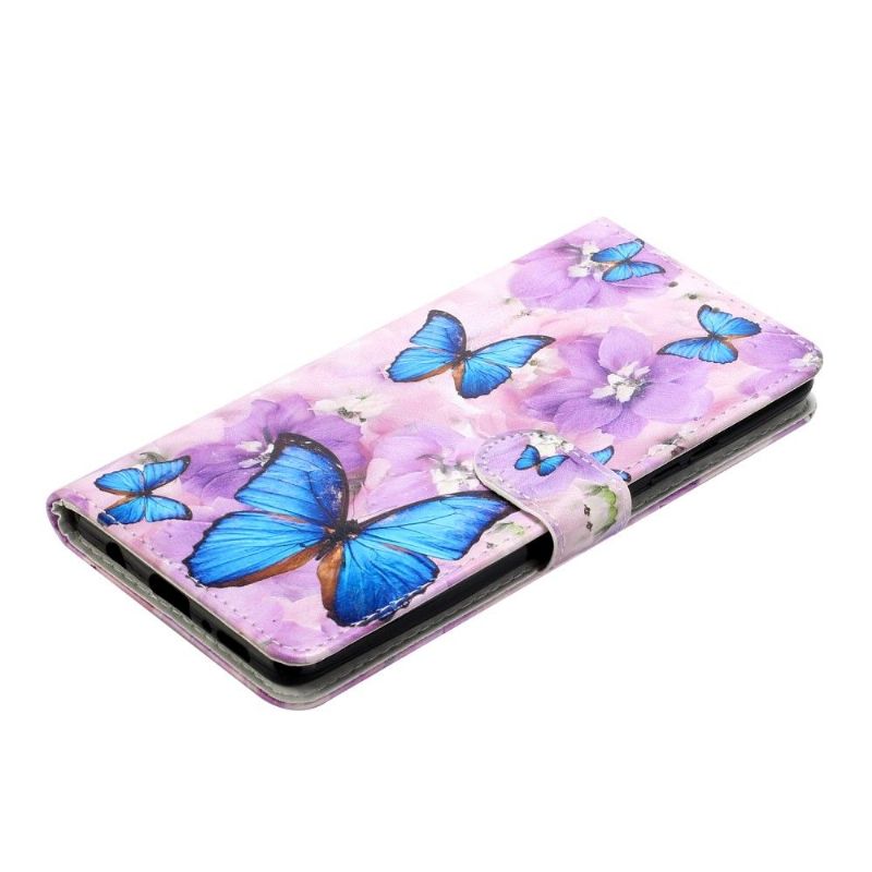 Housse Samsung Galaxy A42 5G papillons bleus et fleurs