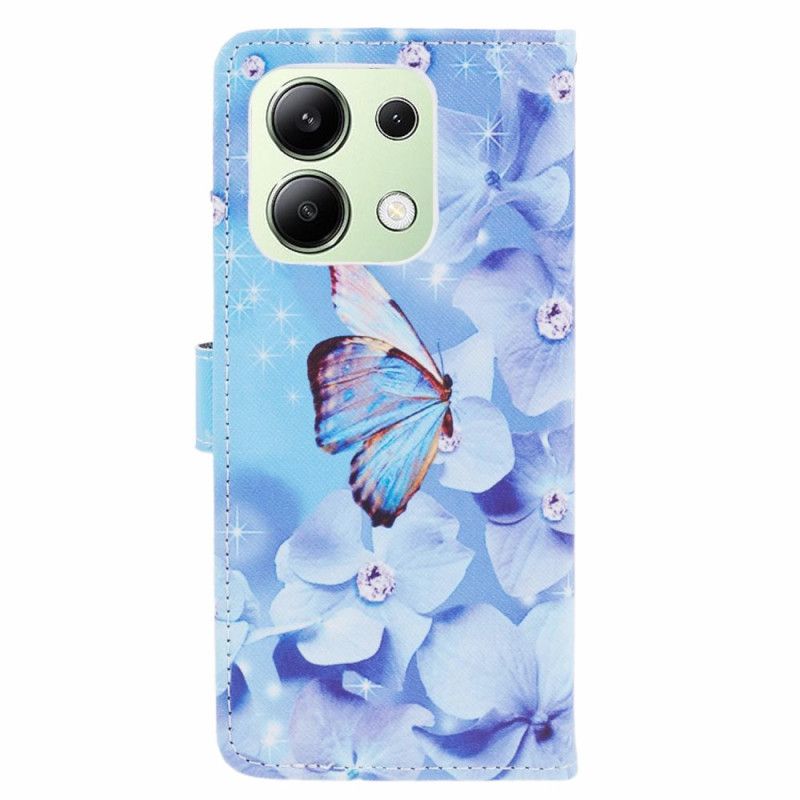 Housse Xiaomi Redmi Note 13 4G Fleurs et Papillon Bleus à Lanière