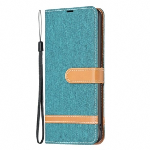 Housse iPhone 16 Plus Tissu Jeans à Lanière