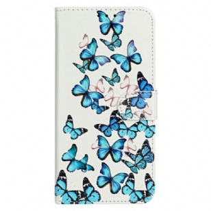 Housse iPhone 16 Plus Vol de Papillons Bleus