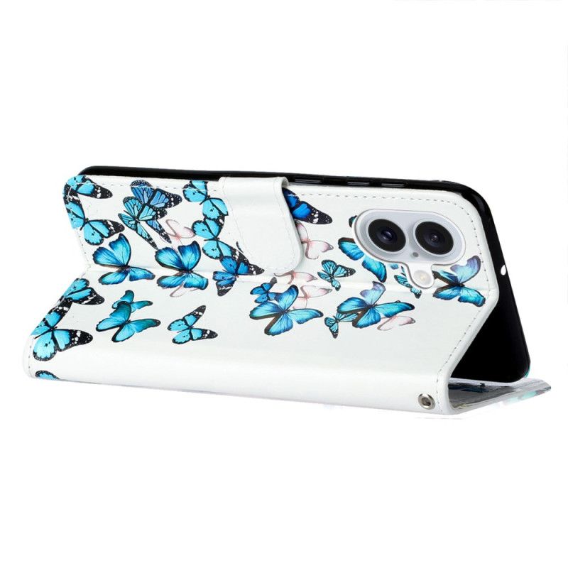 Housse iPhone 16 Plus Vol de Papillons Bleus