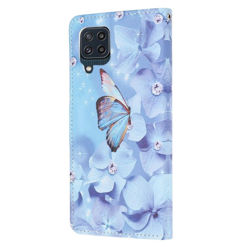 Housse Samsung Galaxy M32 Papillon et fleurs bleues