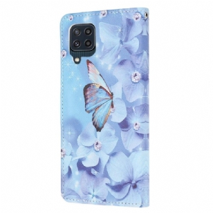 Housse Samsung Galaxy M32 Papillon et fleurs bleues