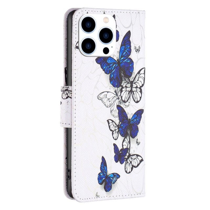 Housse iPhone 16 Pro Impression Papillons Bleus