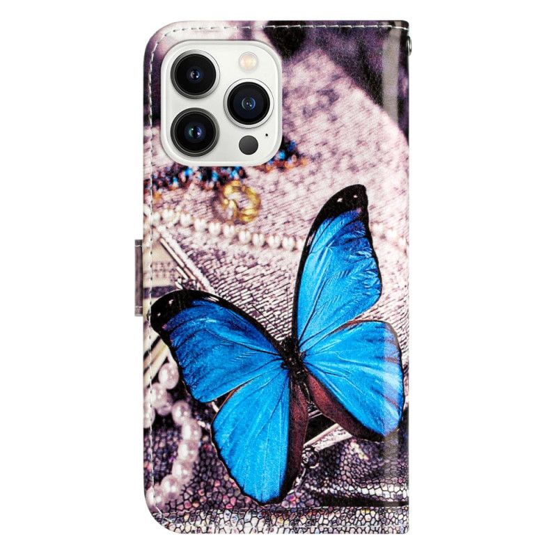 Housse iPhone 16 Pro Papillon Bleu à Lanière