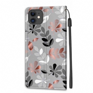 Housse iPhone 11 Illustration feuilles sauvages